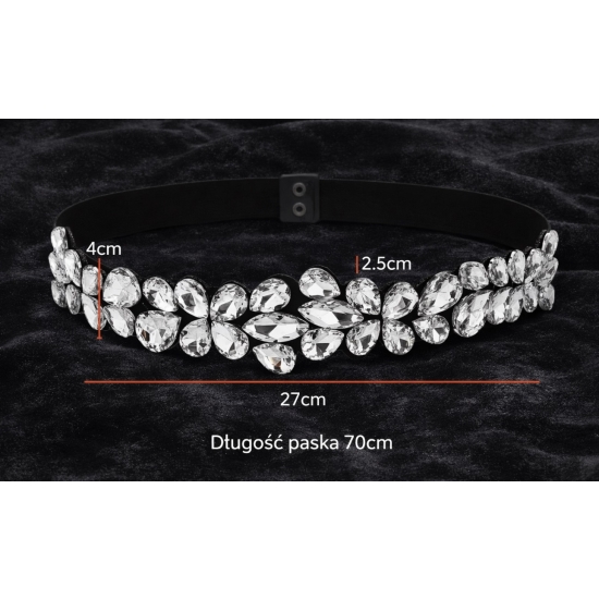 Elastyczny pasek z kryształową aplikacją – elegancki detal, który zmienia stylizację.